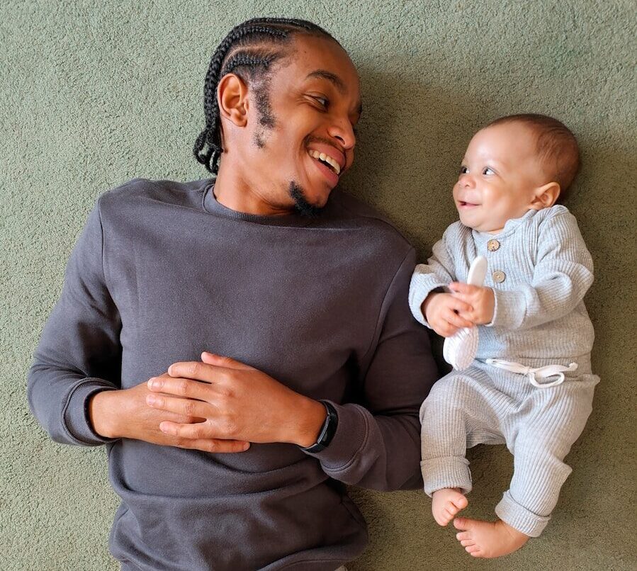 a person holding a baby